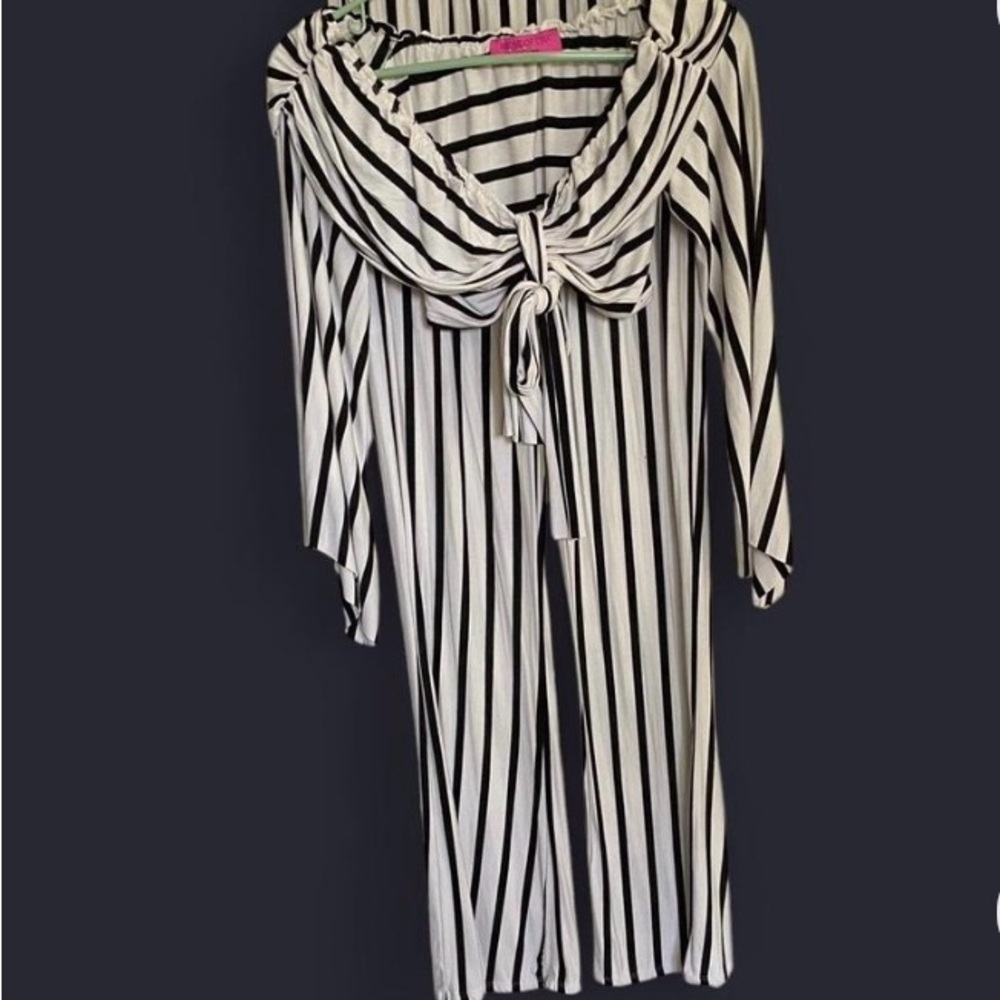 Women’s two piece adorable outfit by House of chic. Striped pants and top.